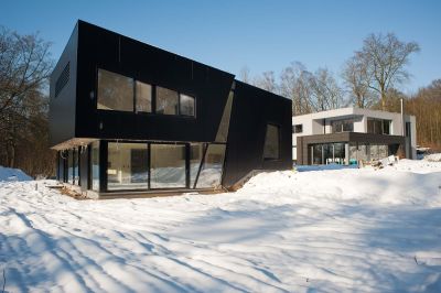 Twee stalen woningen, twee broers-architecten